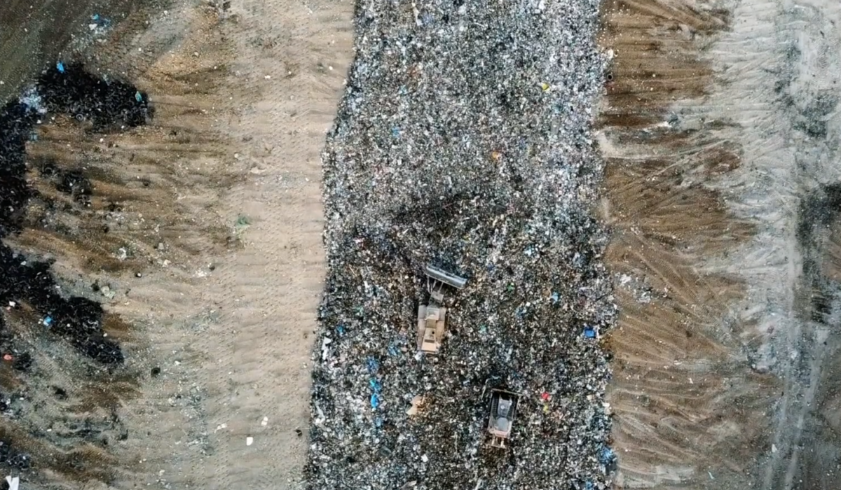 Landfill with garbage and glass